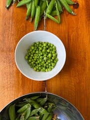 green young sweet peas in a plate, vegetable