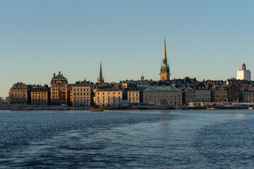 Fototapeta na wymiar Stockholm old town (Gamla Stan) seen from the boat on sunny day