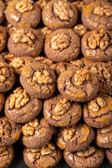 Cocoa and walnut cookies. Fresh walnut cookies. Bakery products. close up