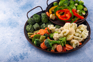 Different frozen vegetables. Food storage.