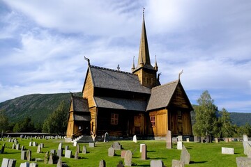 Fototapeta na wymiar Stave church in Lom (Lom stave church) - a stave (post) church, located in the Norwegian city of Lom. It was created in the middle of the 12th century. Norway