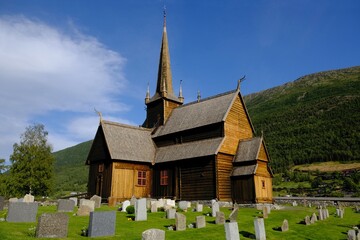 Fototapeta na wymiar Stave church in Lom (Lom stave church) - a stave (post) church, located in the Norwegian city of Lom. It was created in the middle of the 12th century. Norway