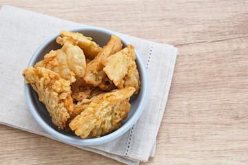 Crispy Fried Oyster Mushroom or Jamur Krispi served with chilli sauce, Indonesian snack
