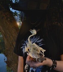 man with a bird skeleton