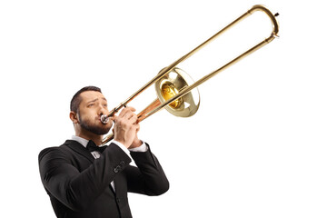 Elegant young man playing a trombone