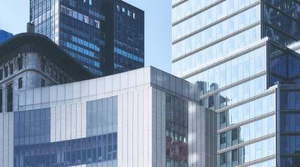 Old and modern buildings in New York City, color toning applied, urban background, USA.