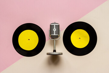 Record the music concept with vinyl records and microphone, top view