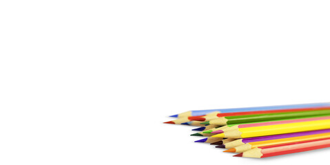Multicolored pencils on a white background with copy space. Back to school, School items for drawing. High quality photo