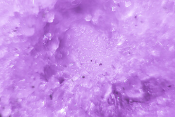 abstract background of snowflakes of purple color with copy space