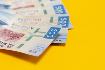 side view of 500 mexican pesos bills. economy