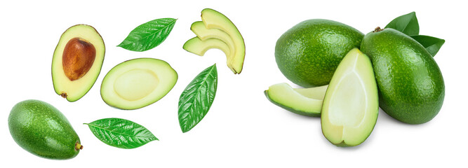 avocado and slices decorated with green leaves isolated on white background. Top view. Flat lay