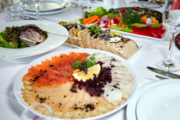 Served buffet table with various banquet dishes