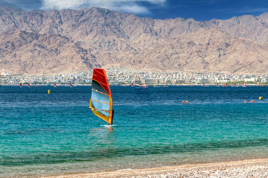 Water sport activities and windsurfer on the Red Sea