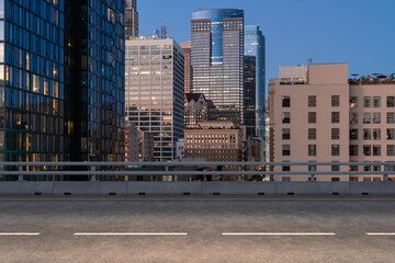 Empty urban asphalt road exterior with city buildings background. New modern highway concrete...