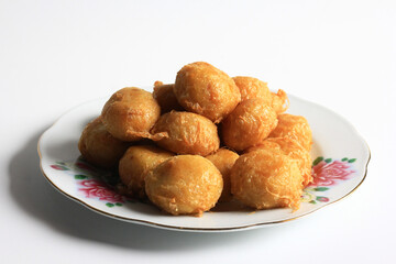 Indonesian food : Perkedel is fried patties, made of ground potatoes and minced meat and vegetables, isolated on white background.