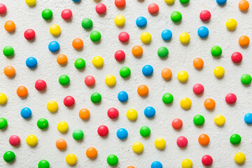 colorful candies as background top view. Seamless pattern with candy. Many sweet candies close-up