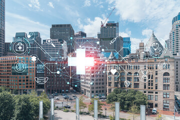 Financial downtown city view panorama of Boston from Harbor area at day time, Massachusetts. Glowing healthcare digital medicine icons. The concept of treatment from disease, Threat of pandemic
