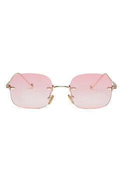 Close-up shot of fashion rimless glasses with pink lenses and with thin temples. Rectangular glasses without frames are isolated on a white background. Front view.