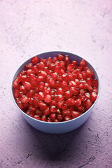 Pomegranate seeds in a bowl
