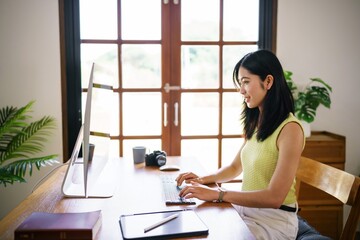 Graphic designer working on digital tablet and computer. Designer Asian Woman artist drawing on graphic tablet  Artist Creative Designer sketch graphic drawing creative