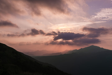 Watch the romantic Crepuscular Ray (cloud gap light) on the mountain. Buyan Pavilion, Shuangxi District, New Taipei City. Taiwan