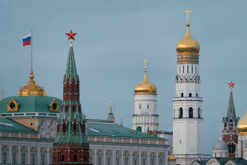 Fototapeta na wymiar Moscow, Russia - February 22, 2022: View of the Armory Tower, the Armory Chamber and the Ivan the Great Bell Tower.