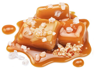 Salty caramel candies in milk caramel sauce with salt crystals isolated on white background. - obrazy, fototapety, plakaty