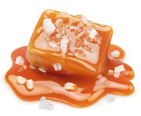 Salty caramel candy in milk caramel sauce with salt crystals isolated on white background. - 560680382