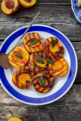 peaches in a vintage bowl