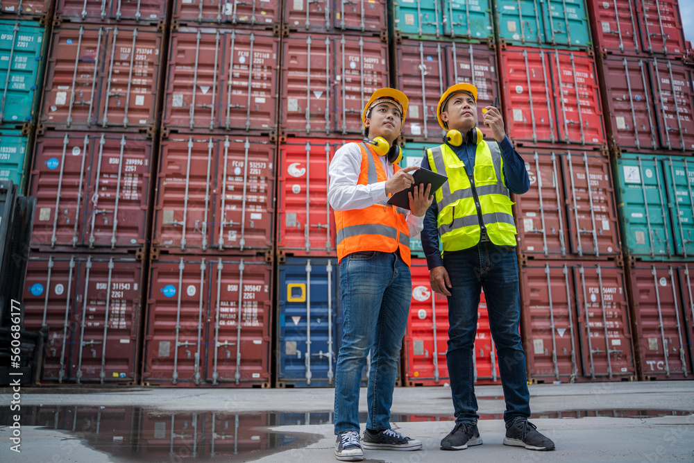 Poster Engineer working and checking a quality of containers box from cargo ship for export and import,Container Shipping Logistics Engineering concept.