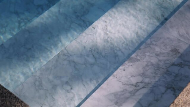 steps water of swimming pool