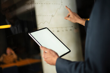 Close up of man using digital tablet