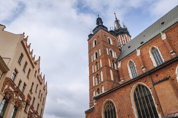 Fototapeta na wymiar Basilica of Saint Mary on Main Square in Old Town of Krakow city, Lesser Poland Voivodeship of Poland