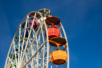 Ferris wheel and blue sky.