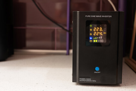Pure sine wave inverter. Backup Power UPS 1000 W with stabilizer for home.