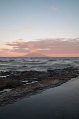 sunset over the sea mountain at sunset