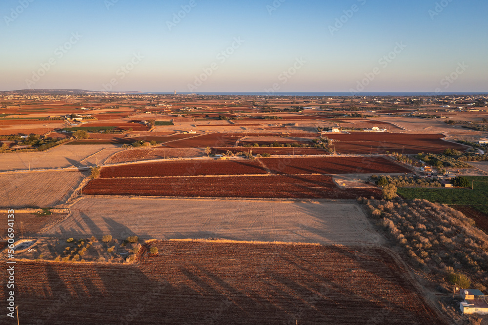 Poster Fields with red soil around Avgorou village in Famagusta District in Cyprus island country