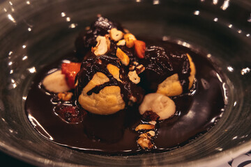 Chocolate profiteroles dessert in restaurant in Cyprus island country