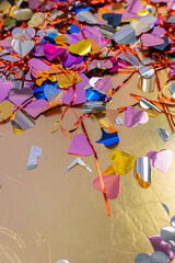 confetti of hearts on the floor after the party. Vertical
