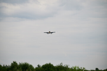 Commercial airplane flying in the sky.