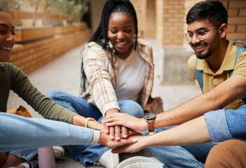 Hands, group and teamwork of students in university for collaboration, unity or motivation....