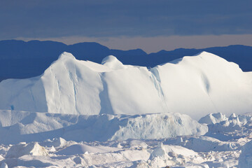 big icebergs floating over sea