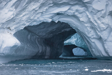 double cave in big icebergs wall
