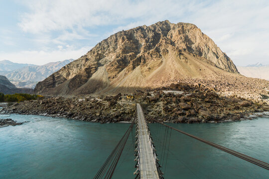 Suspension bridge over river in  Himalayas