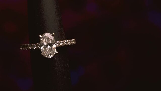 Beautiful Isolated Diamond Ring against Black Background
