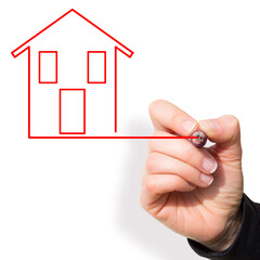 Construction of residential building - concept with hand drawing a home icon with a pencil - image with copy space