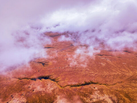 Infrared shot of surreal Martian rocky landscape.