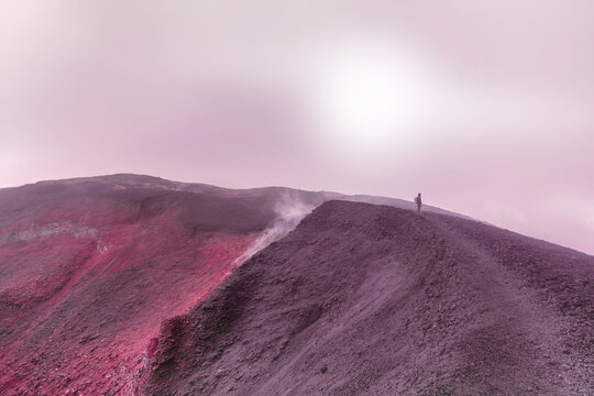 Infrared scenery of hiker in volcano crater similar to Mars.