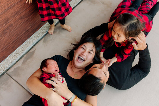 Laughing mom with family
