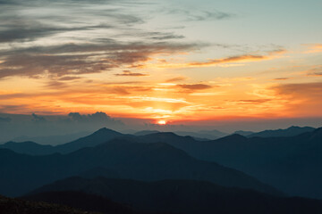 Sunset sky over mountains